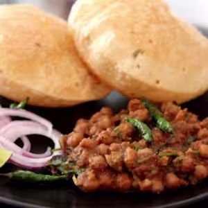 Bhojan Xpress signature dishes Chole BhaturePav BhajiVegetarian Thali
